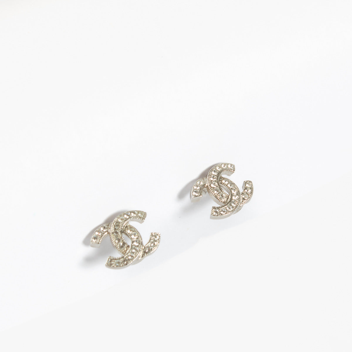 Chanel crystal-embellished CC stud earrings.