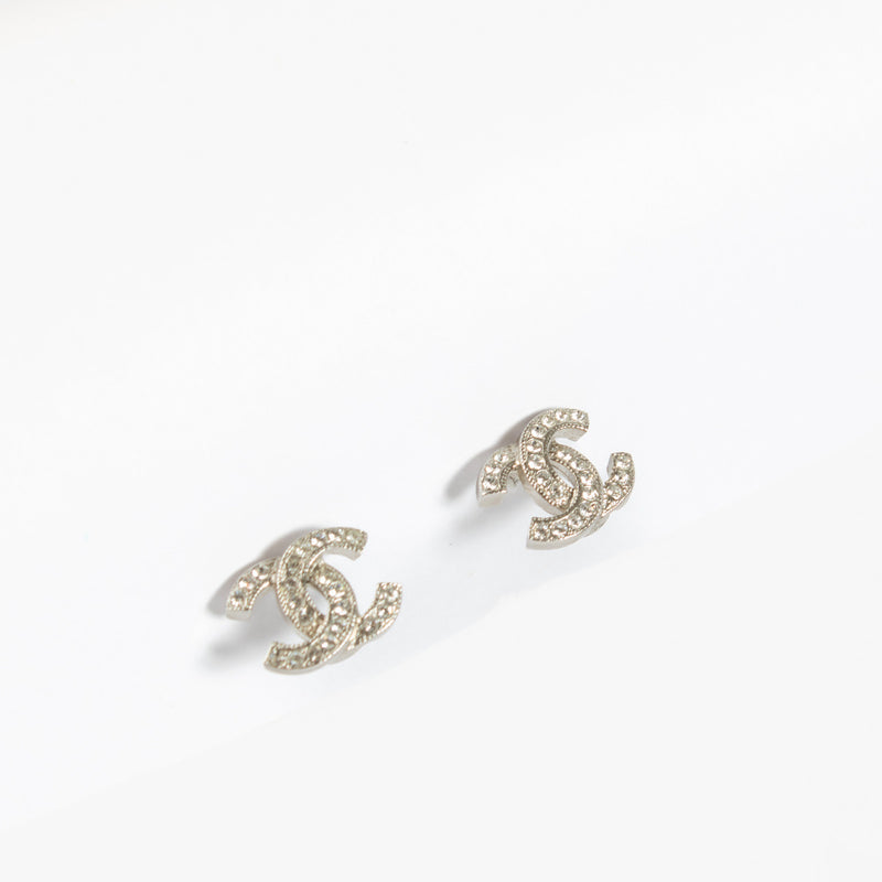 Chanel crystal-embellished CC stud earrings.