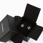 Chanel crystal-embellished CC stud earrings.