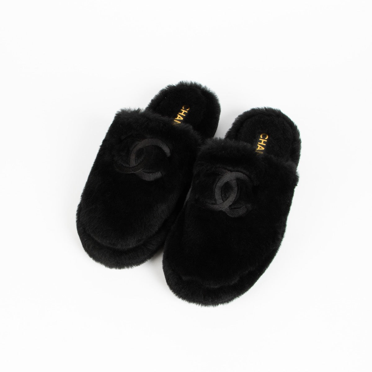 Authentic pre-loved Chanel Black Faux Fur Slippers With Pouch - Size 40 on Labellov.com