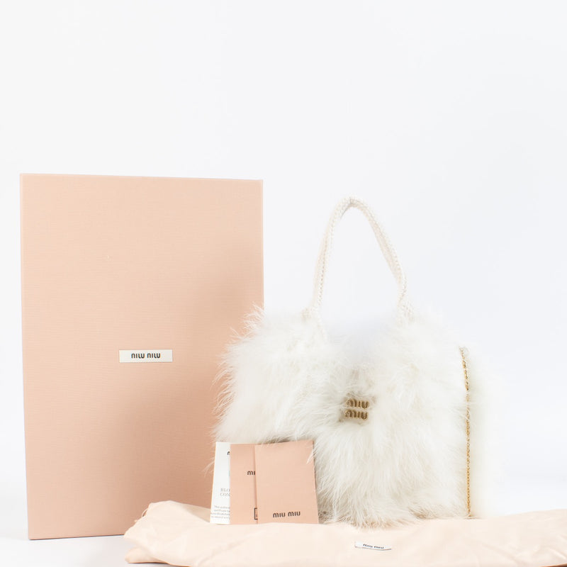 Shop 100% authentic second hand Miu Miu IVY Crochet Handbag With Feathers on Labellov.com
