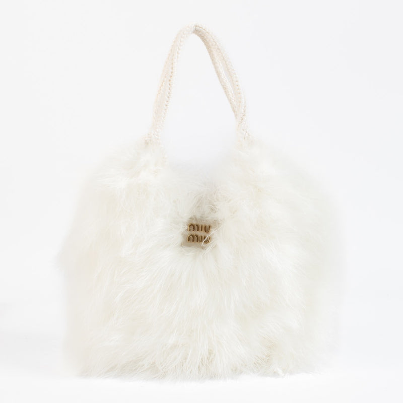 Shop 100% authentic second hand Miu Miu IVY Crochet Handbag With Feathers on Labellov.com