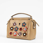 Shop this 100% authentic Fendi Beige Leather Dot Com Flower Appliqué Crossbody Bag at Labellov.com