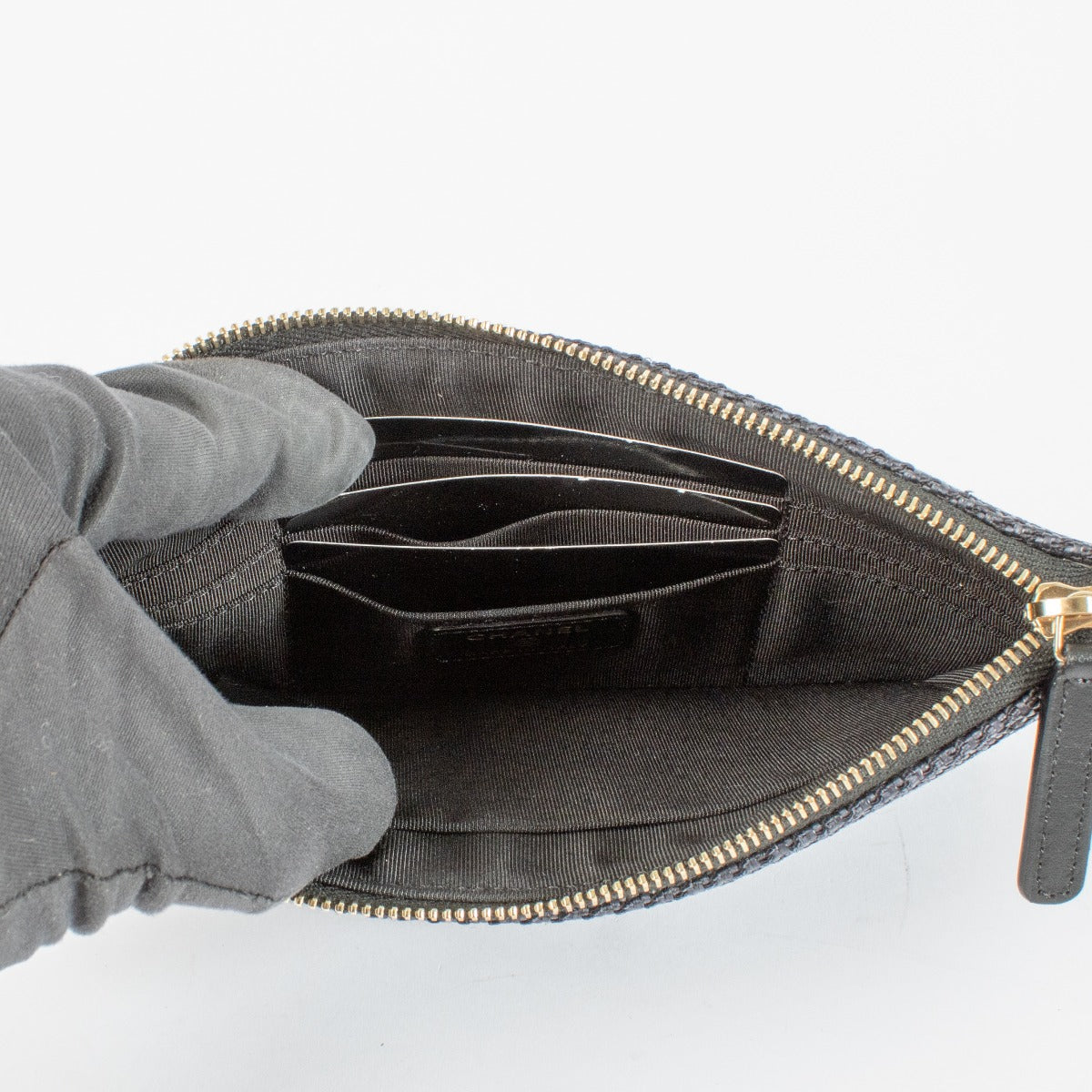 Authentic preloved Chanel Black Tweed Beauville Pouch on Labellov.com
