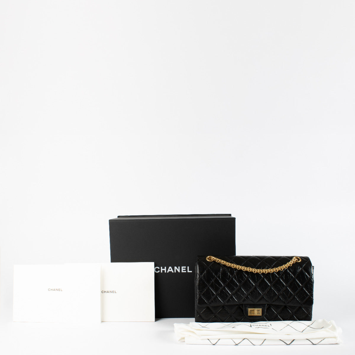 Sac Chanel Reissue 2.55 grand modèle en cuir de veau vieilli noir