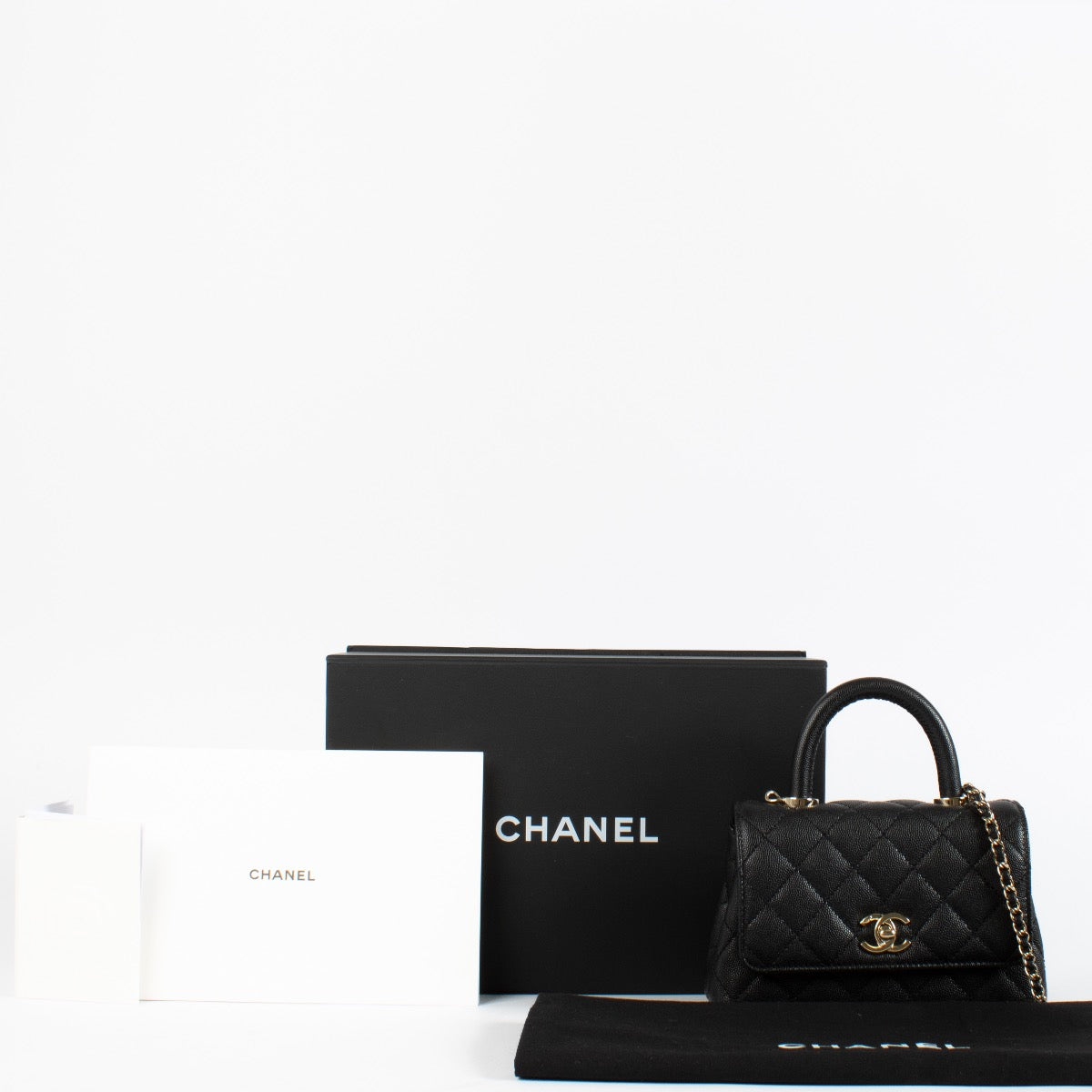 authentic preloved Chanel Black Caviar Mini Coco Handle Bag on Labellov.com