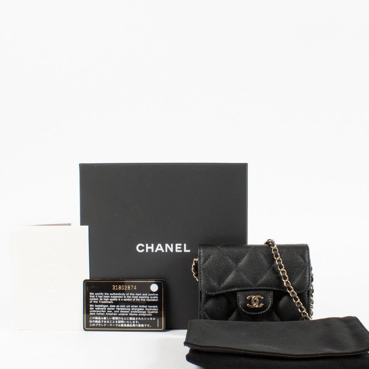 Authentic preloved Chanel Black Caviar Classic Card Holder with Chain on Labellov.com