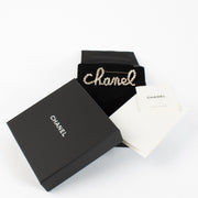 authentic preloved Chanel 19K Silver Logo Brooch on Labellov.com