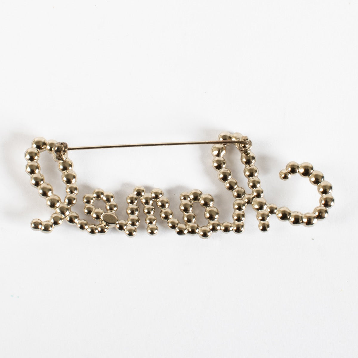 authentic preloved Chanel 19K Silver Logo Brooch on Labellov.com