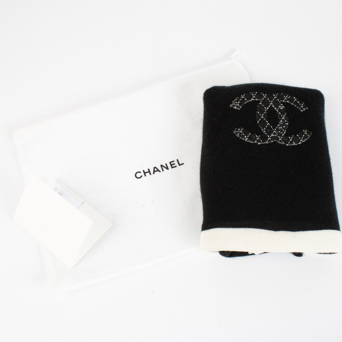 authentic preloved Chanel Black Cashmere Scarf With Sequin Logo on Labellov.com