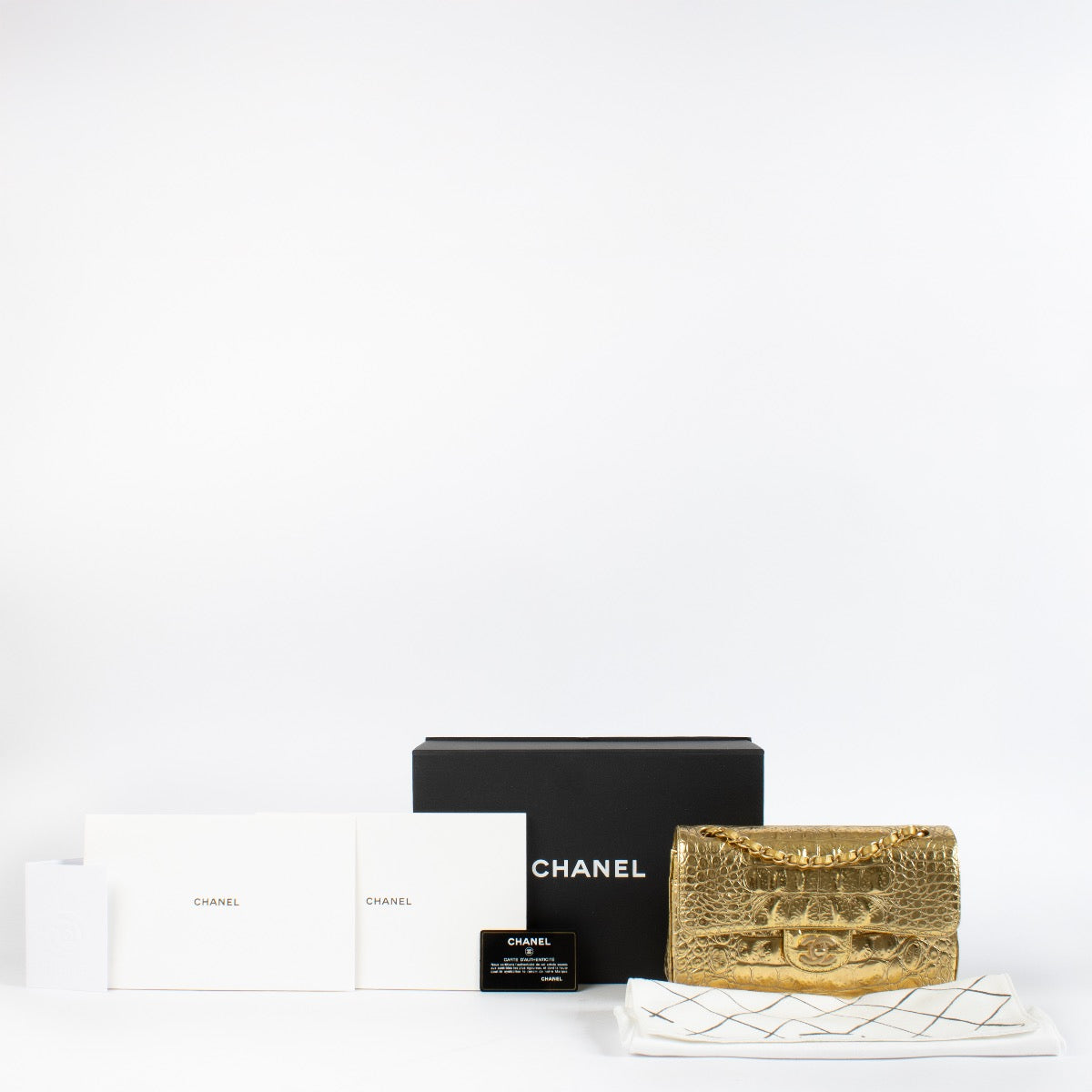 shop 100% authentic second hand Chanel 19A Gold Crocodile Embossed Small Classic Flap Bag on Labellov.com