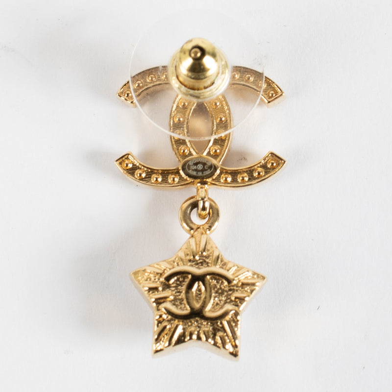 Authentic pre-loved Chanel Crystal CC Star Earrings Gold Tone 24C on Labellov.com