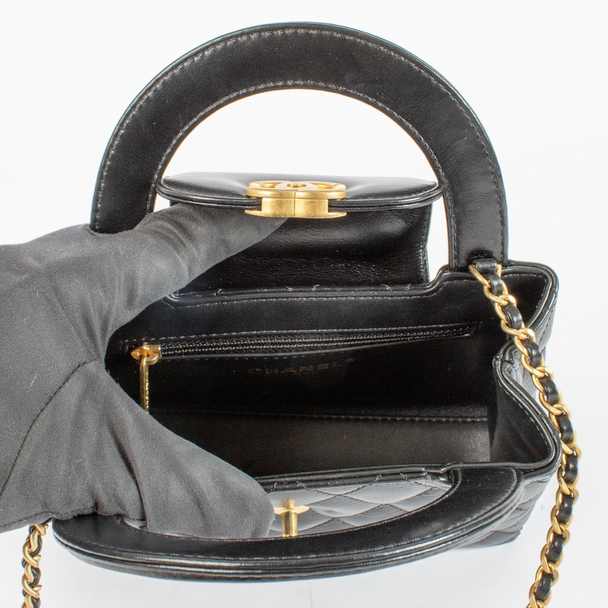 shop 100% authentic second hand Chanel Black Lambskin Kelly Nano Top Handle Bag on Labellov.com