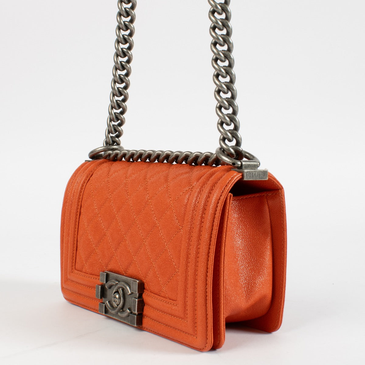 Authentic pre-loved Chanel Orange Caviar Small Chanel Boy Bag on Labellov.com