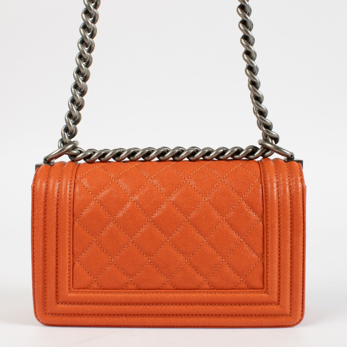 Authentic pre-loved Chanel Orange Caviar Small Chanel Boy Bag on Labellov.com