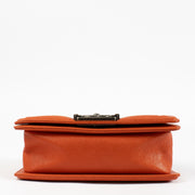 Authentic pre-loved Chanel Orange Caviar Small Chanel Boy Bag on Labellov.com