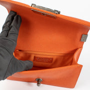 Authentic pre-loved Chanel Orange Caviar Small Chanel Boy Bag on Labellov.com