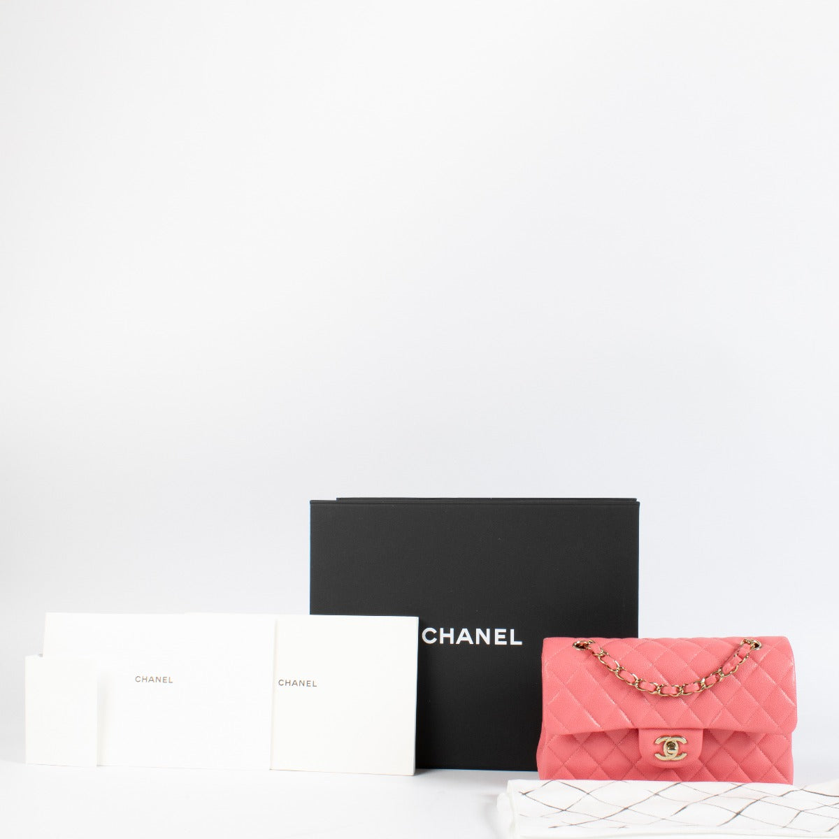 Authentic pre-loved Chanel Hot Pink Caviar Small Classic Handbag on Labellov.com
