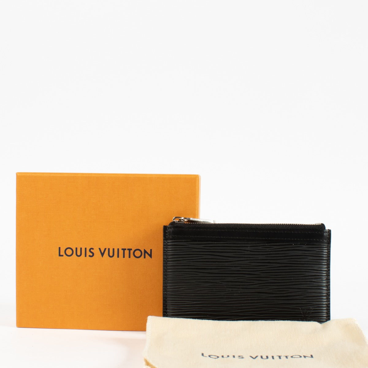 Authentic pre-loved Louis Vuitton Black Epi Key Pouch on Labellov.com