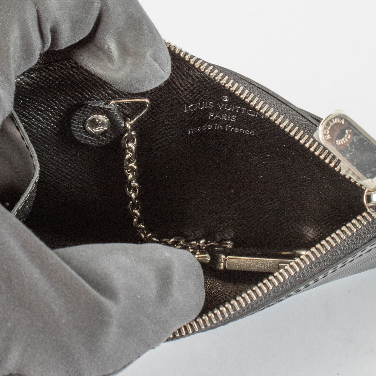 Authentic pre-loved Louis Vuitton Black Epi Key Pouch on Labellov.com