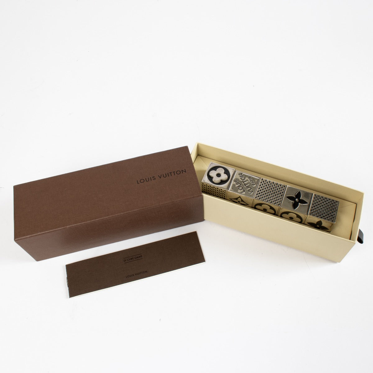 Authentic pre-loved Louis Vuitton Monogram Cube Dice Game Set on Labellov.com