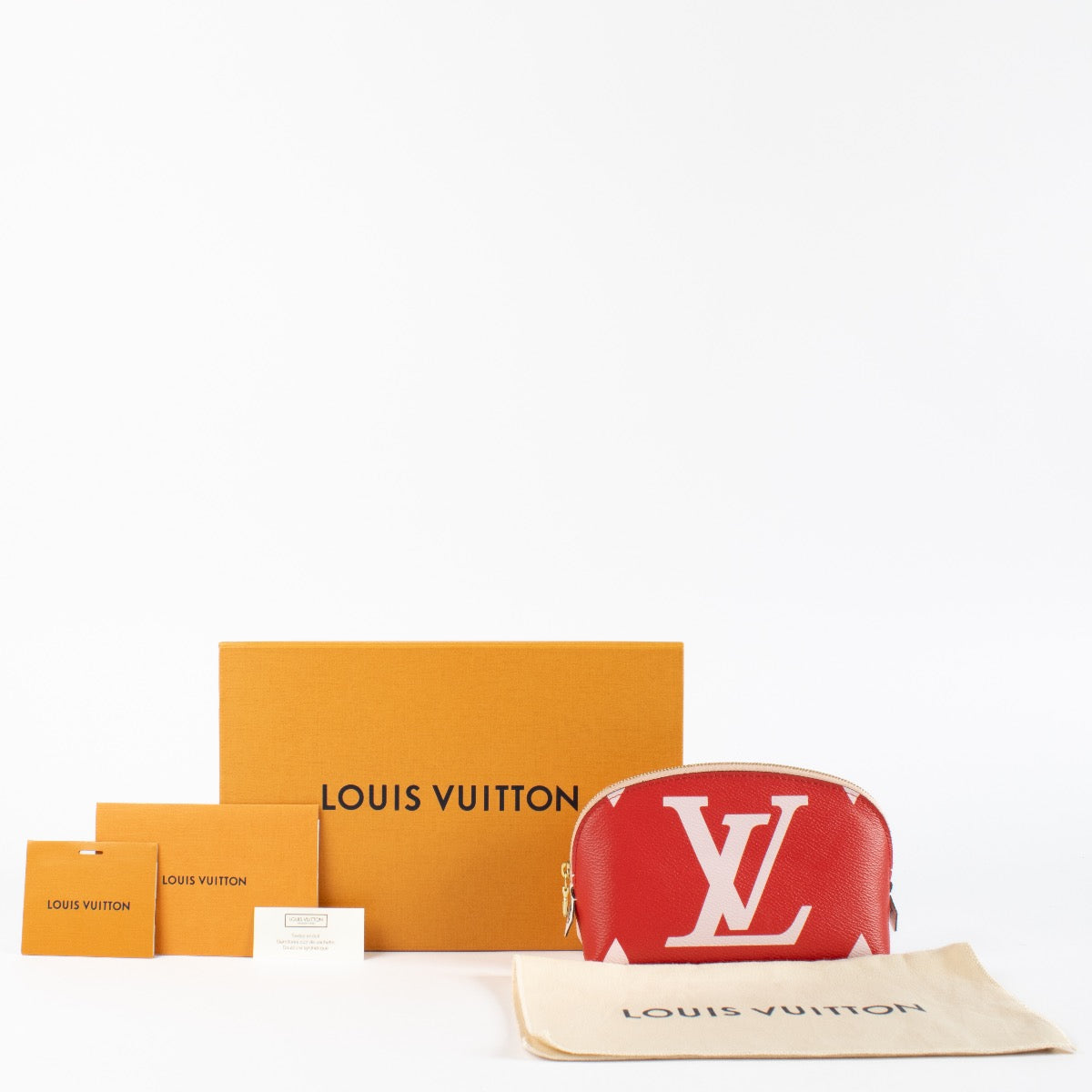 authentic preloved Louis Vuitton Cosmetic Pouch Giant Monogram Pink-Red on Labellov.com