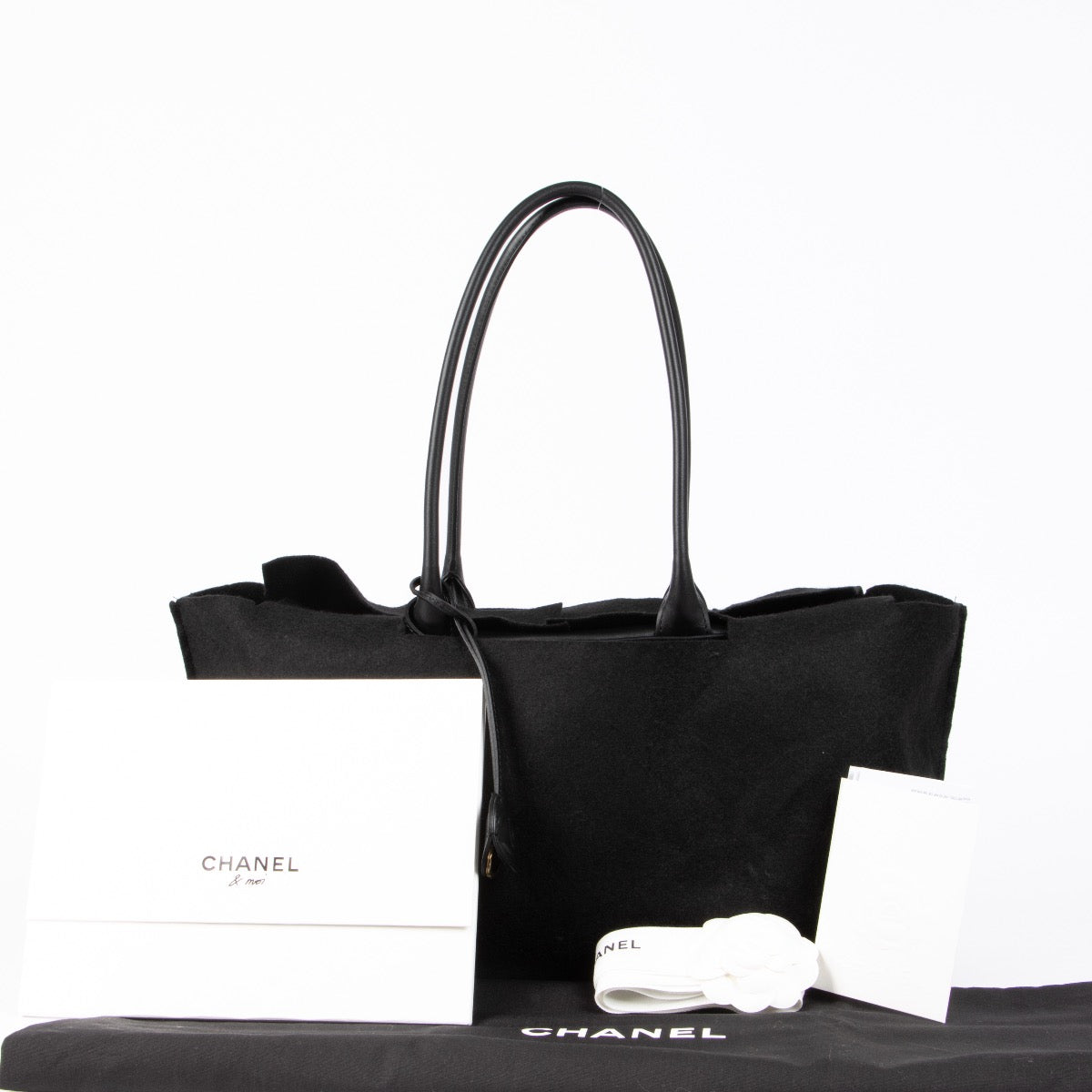 Authentic pre-loved Chanel Black Large Calfskin Bowling Shoulder Bag on Labellov.com
