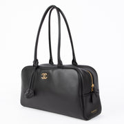 Authentic pre-loved Chanel Black Large Calfskin Bowling Shoulder Bag on Labellov.com