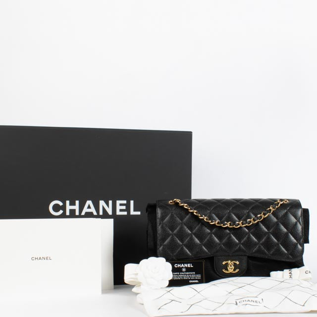 Shop the authentic Chanel Black Caviar Large Flap / Jumbo Classic Bag second hand on Labellov.com.
