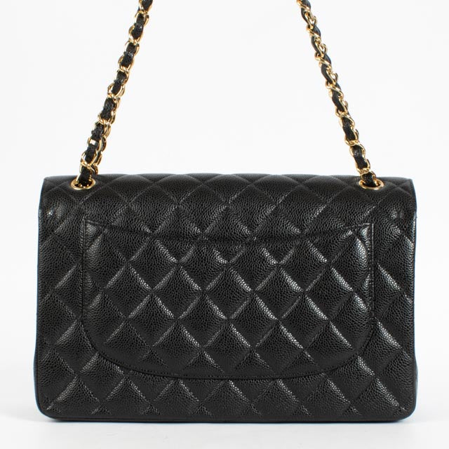 Shop the authentic Chanel Black Caviar Large Flap / Jumbo Classic Bag second hand on Labellov.com.