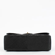 Shop the authentic Chanel Black Caviar Large Flap / Jumbo Classic Bag second hand on Labellov.com.