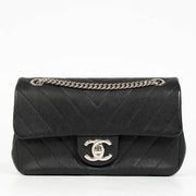Authentic pre-loved Chanel Black Chevron Calfskin Mini Classic Rectangular Bag on Labellov.com