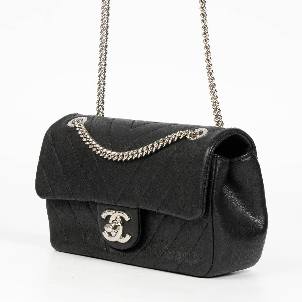 Authentic pre-loved Chanel Black Chevron Calfskin Mini Classic Rectangular Bag on Labellov.com