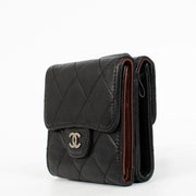 Shop the authentic Chanel Black Lambskin Small Classic Flap Wallet second hand on Labellov.com.