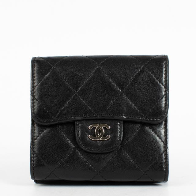 Shop the authentic Chanel Black Lambskin Small Classic Flap Wallet second hand on Labellov.com.