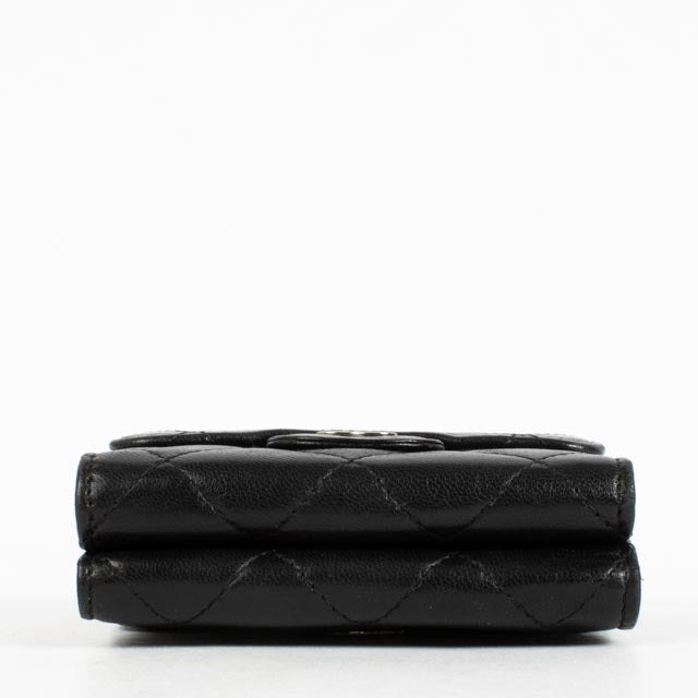 Shop the authentic Chanel Black Lambskin Small Classic Flap Wallet second hand on Labellov.com.