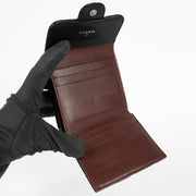 Shop the authentic Chanel Black Lambskin Small Classic Flap Wallet second hand on Labellov.com.
