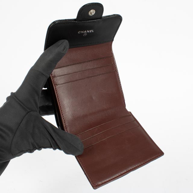 Shop the authentic Chanel Black Lambskin Small Classic Flap Wallet second hand on Labellov.com.