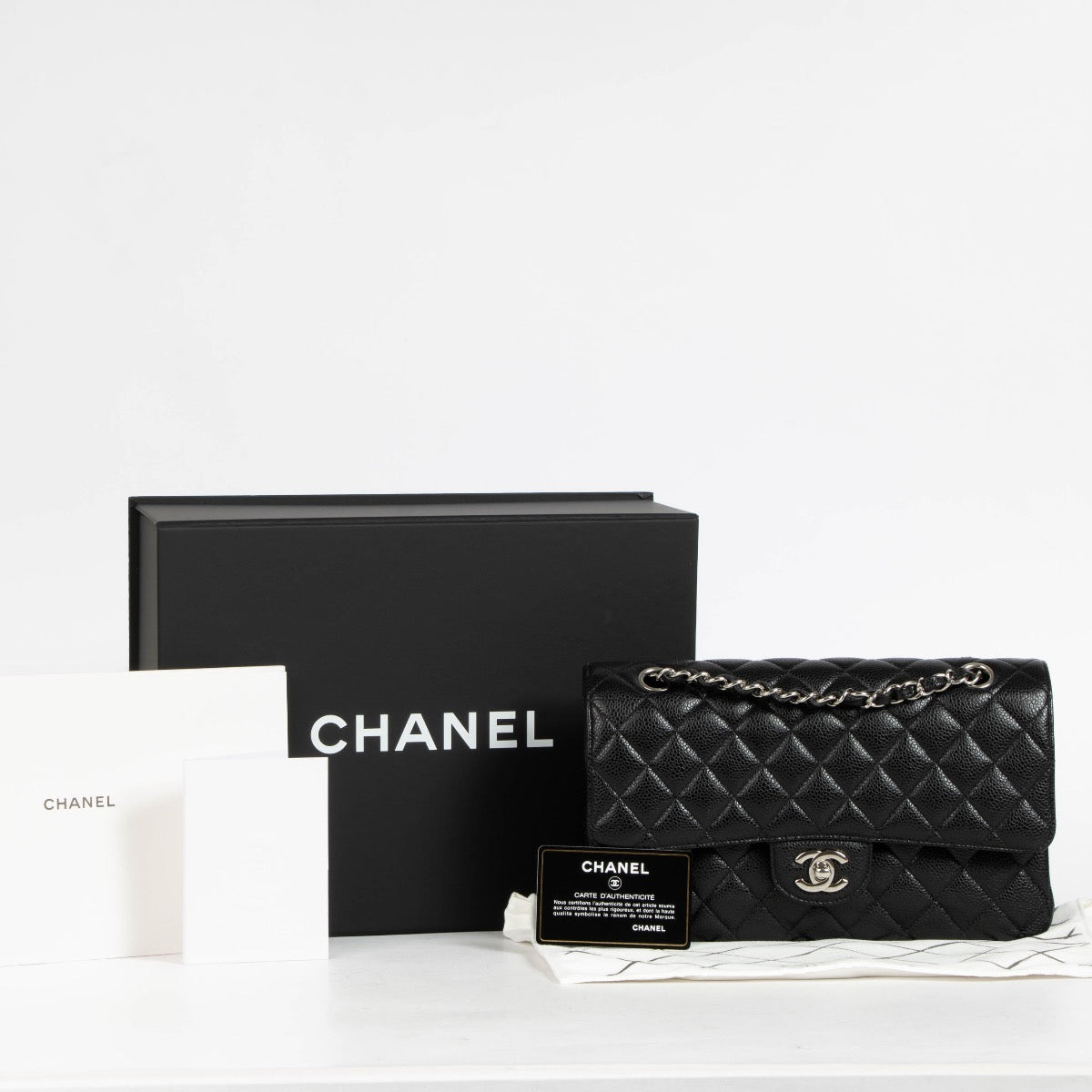 Authentic pre-loved Chanel Classic Flap Black Shoulder bag on Labellov.com