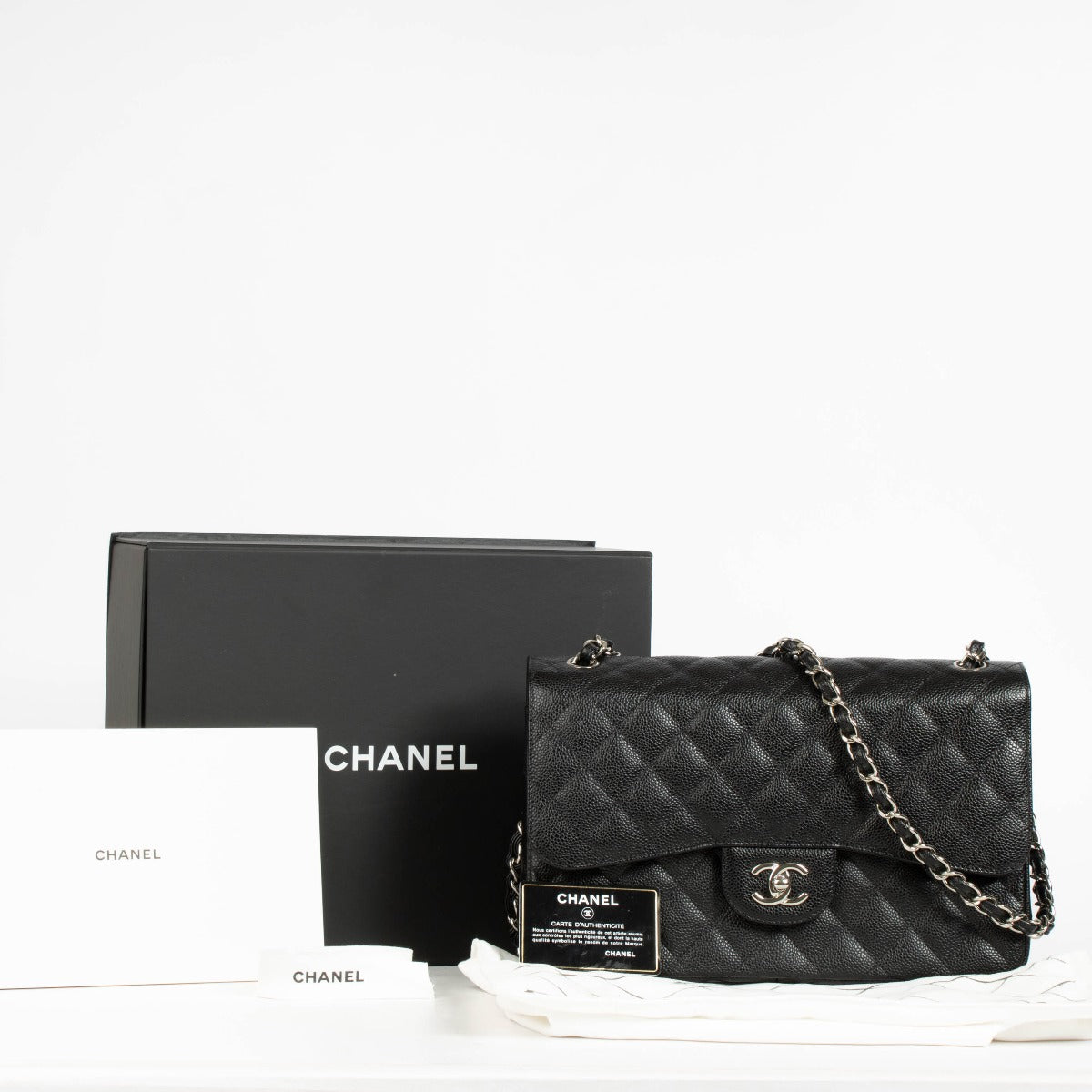 Authentic pre-loved Chanel Classic Large/Jumbo Black Caviar Flap Bag on Labellov.com