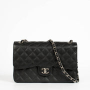 Authentic pre-loved Chanel Classic Large/Jumbo Black Caviar Flap Bag on Labellov.com