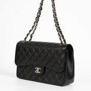 Authentic pre-loved Chanel Classic Large/Jumbo Black Caviar Flap Bag on Labellov.com