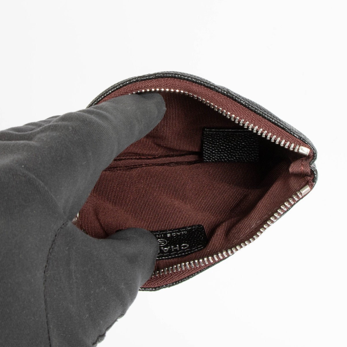 Authentic pre-loved Chanel Black Classic Small Zipped Pouch on Labellov.com