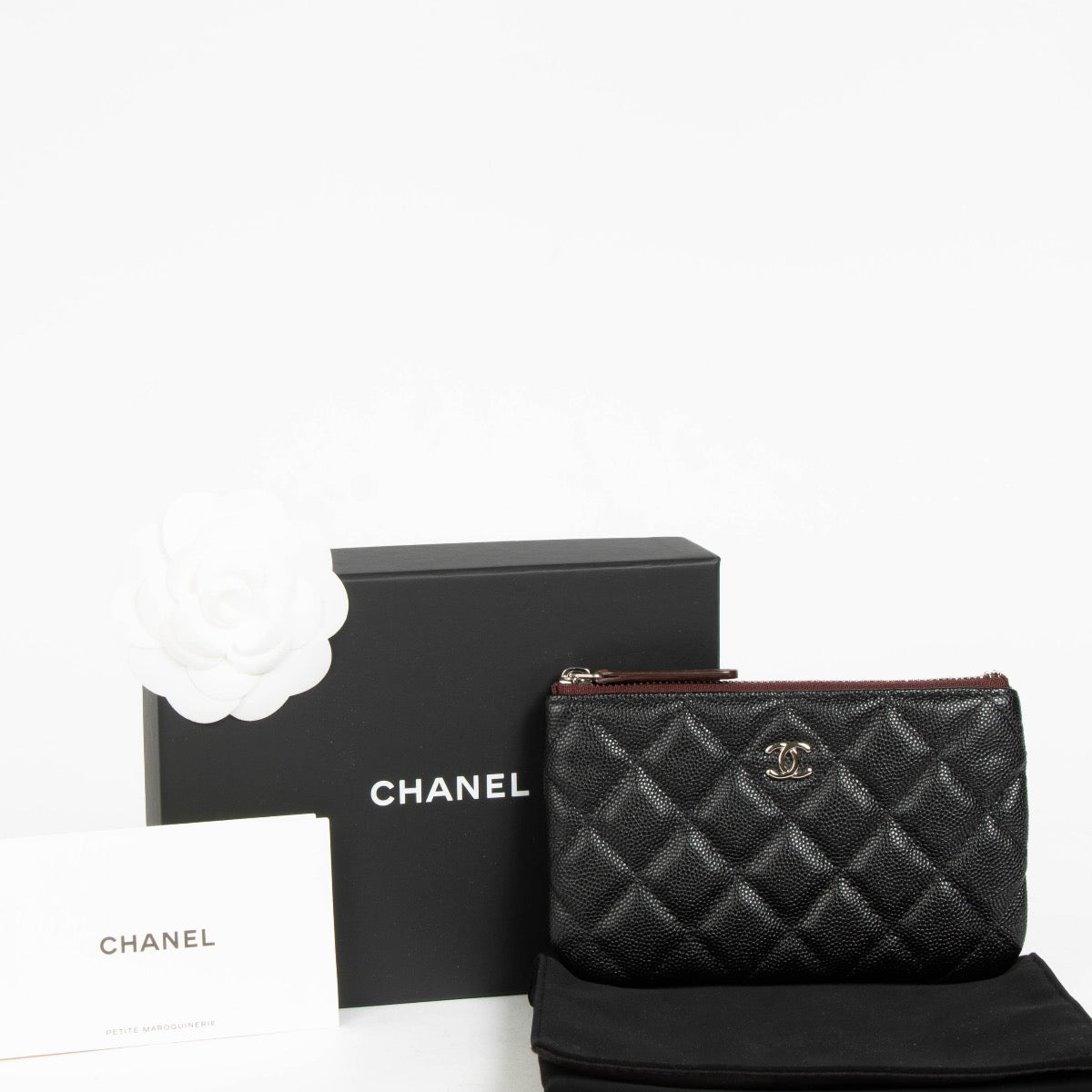 Authentic pre-loved Chanel Black Classic Small Zipped Pouch on Labellov.com