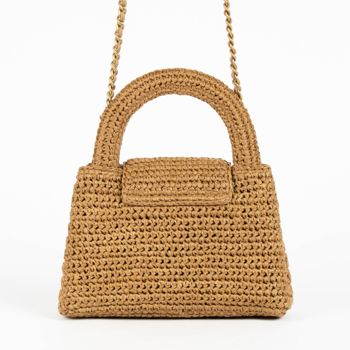 Shop safe online at Labellov in Antwerp, Brussels and Knokke this 100% authentic second hand Chanel Dark Beige Braided Raffia Kelly Nano Bag