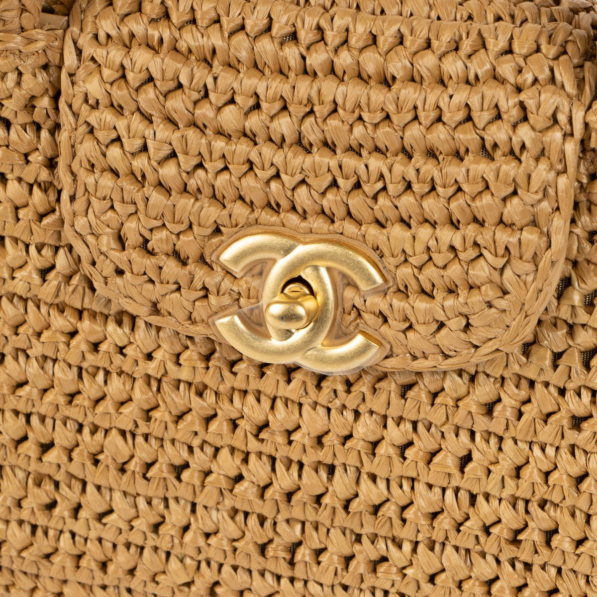 Shop safe online at Labellov in Antwerp, Brussels and Knokke this 100% authentic second hand Chanel Dark Beige Braided Raffia Kelly Nano Bag