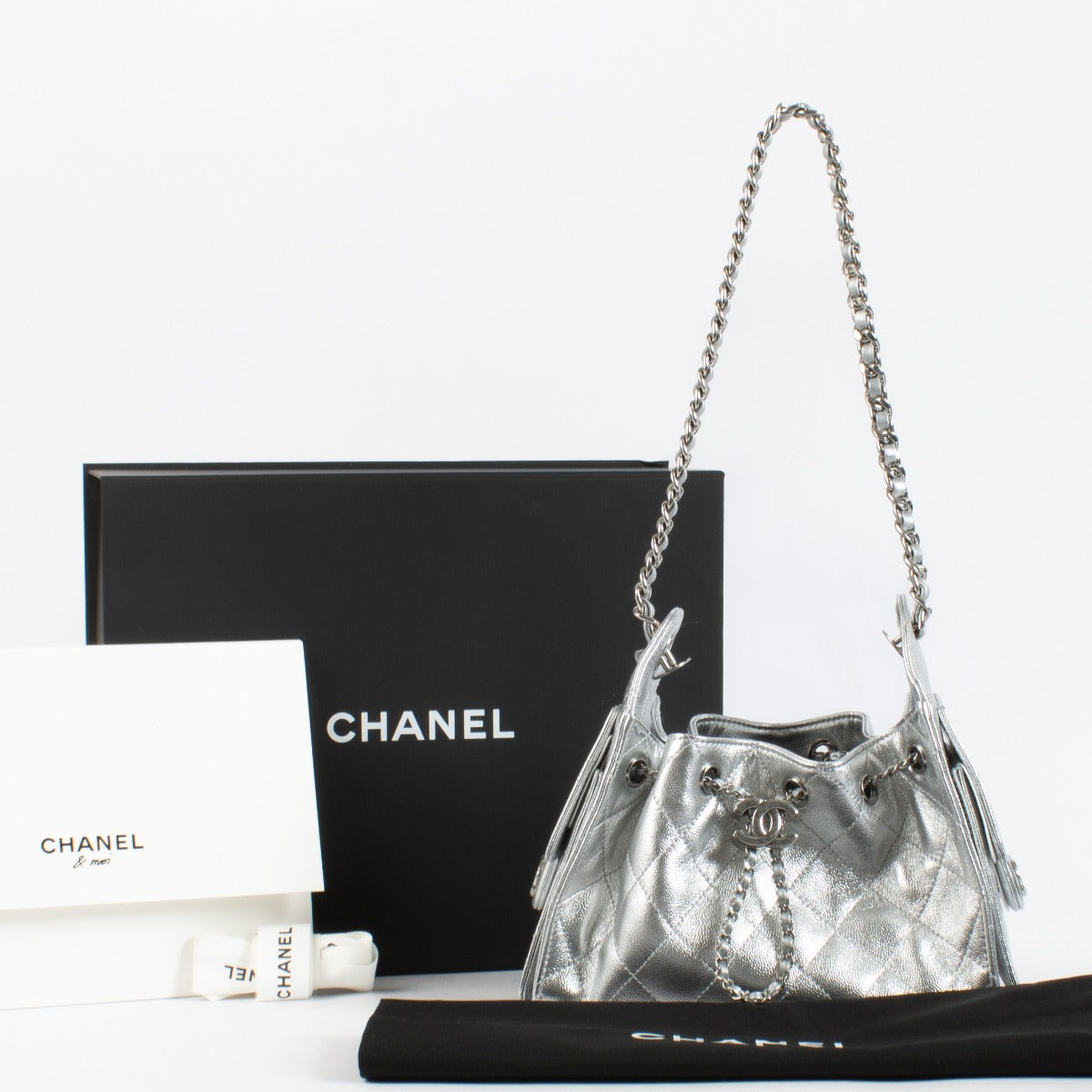 Authentic second hand luxury designer vintage brand new Chanel Metallic Silver Chanel 25 Mini Bag on www.labellov.com