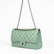 Shop this 100% authentic Chanel Tiffany Blue Reissue Classic Flap Bag at Labellov.com