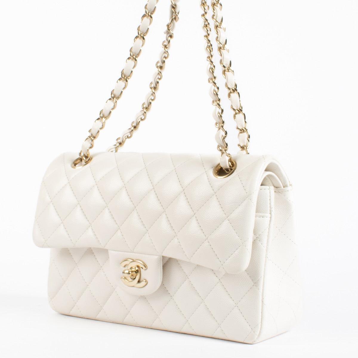 Authentic pre-loved Chanel Small White Caviar Classic Flap Bag on Labellov.com