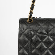 Authentic pre-loved Chanel Black Caviar Large / Jumbo Classic Bag on Labellov.com